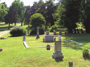 Headstones and grave markers in the cemetery.