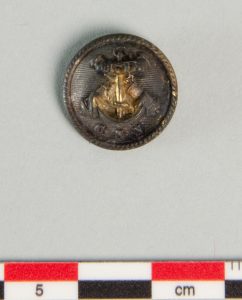 Front of Bremond’s naval button depicting a fouled anchor overlaying crossed cannons (Photo courtesy of DHR).