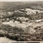A ca.-1953 aerial view of St. Francis De Sales High School
